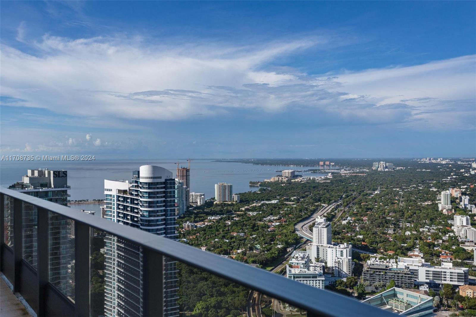 a view of a city skyline from a balcony