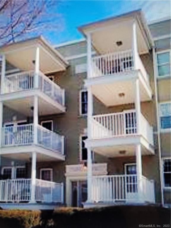 a view of balcony with a deck