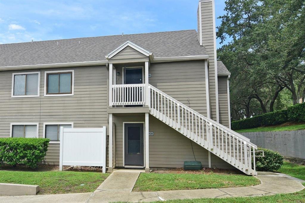 a front view of a house with yard