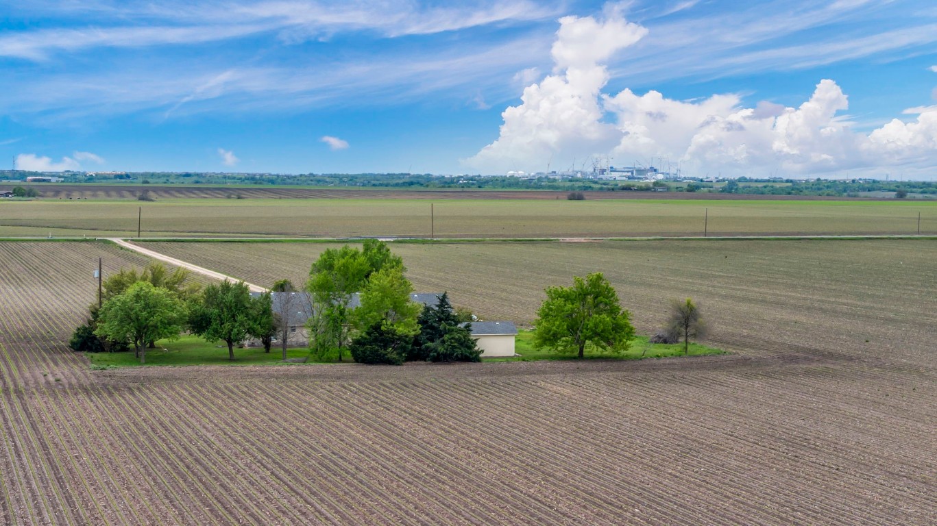 a view of a lake with a big yard