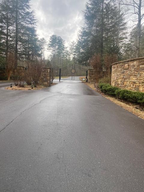 a view of a road with a building in the background