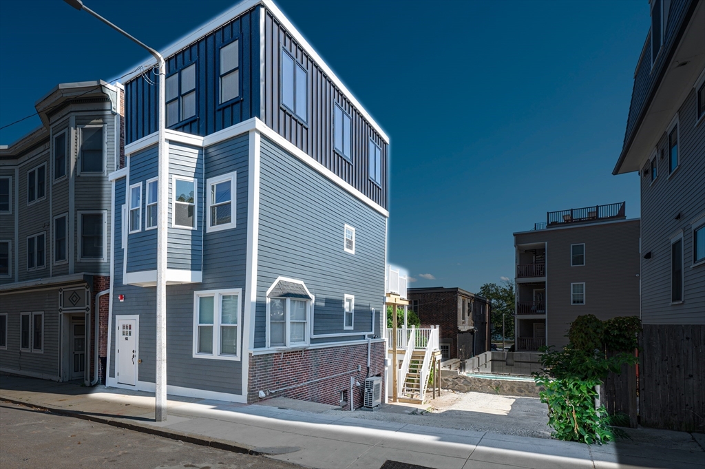 a front view of a building with street view