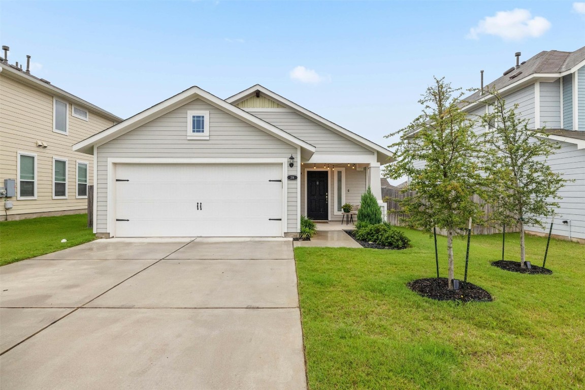 a view of outdoor space yard and garage