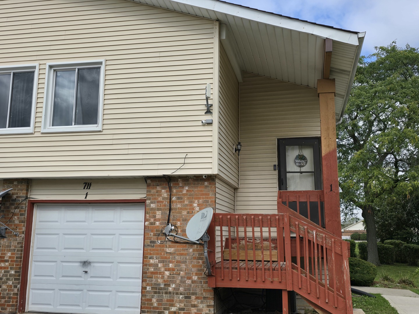 a view of a house with a small porch