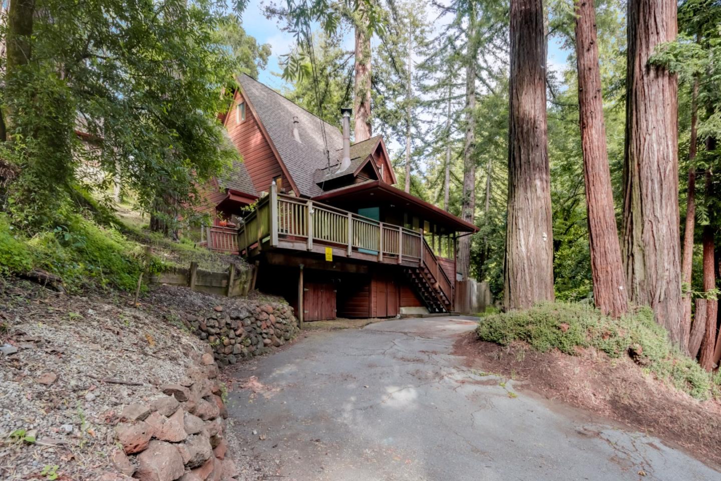 a view of house with trees in the background