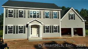 a view of a large house with a yard