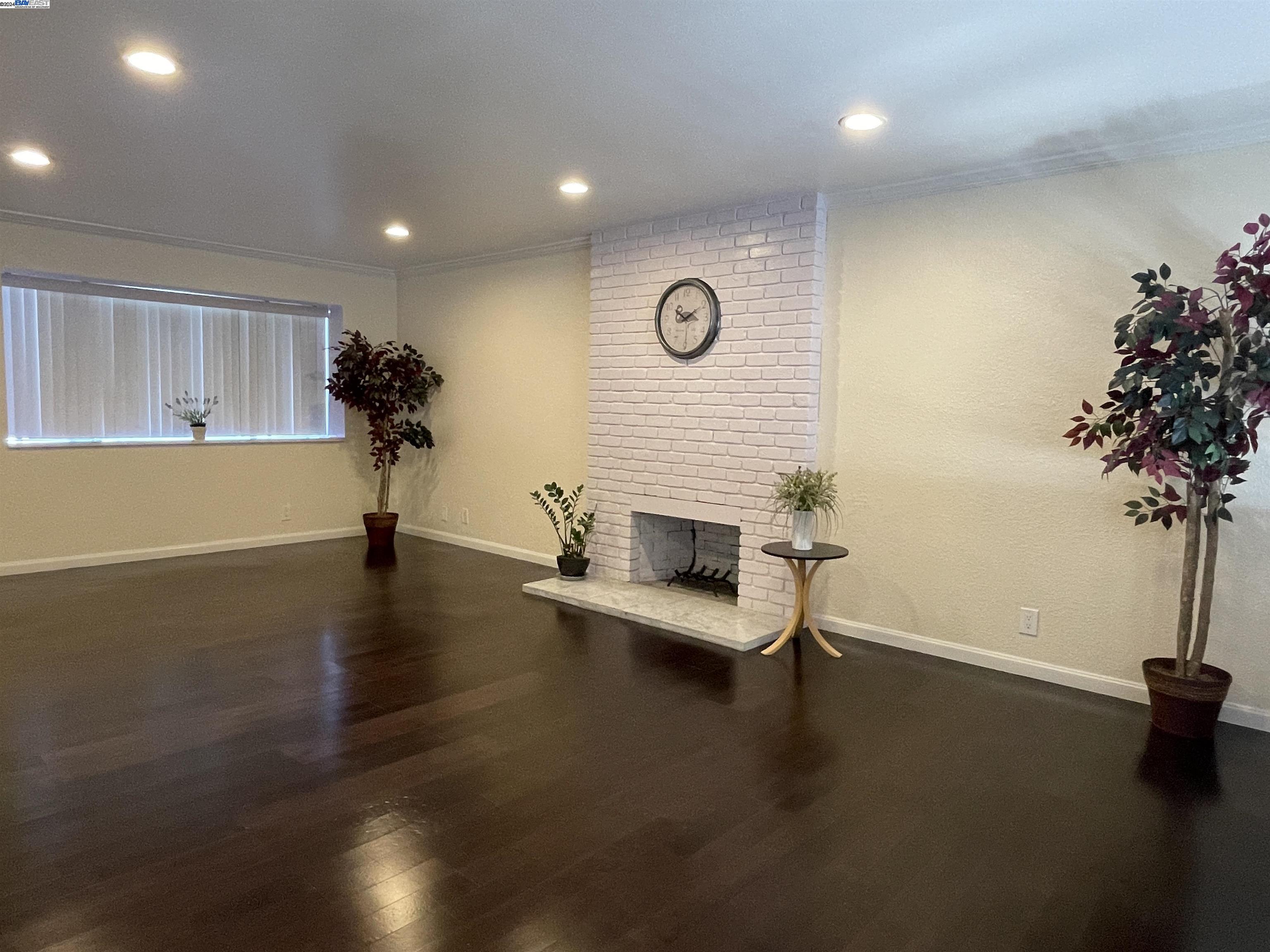 a view of a livingroom with furniture and a table