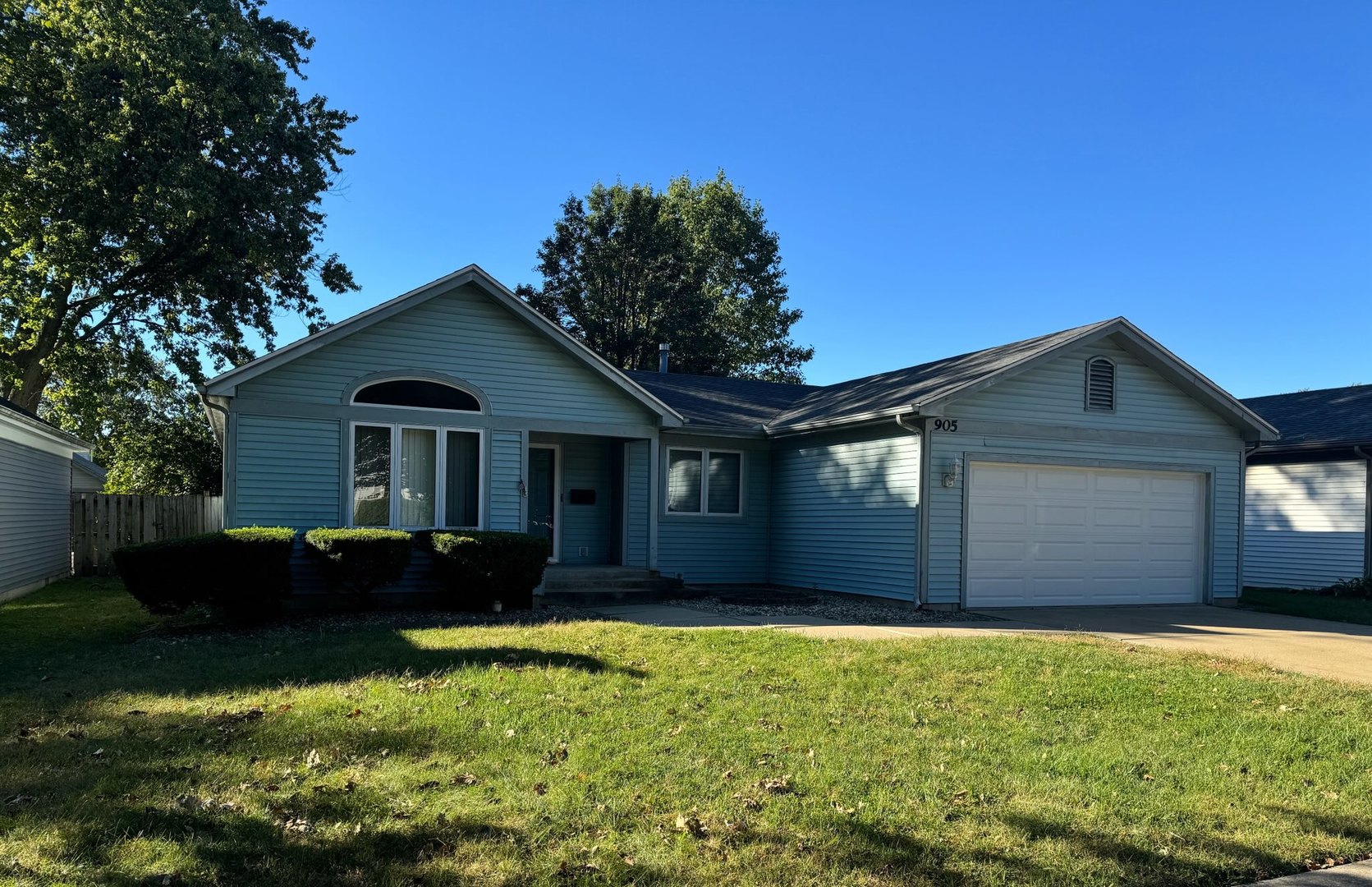 a front view of house with yard and entertaining space