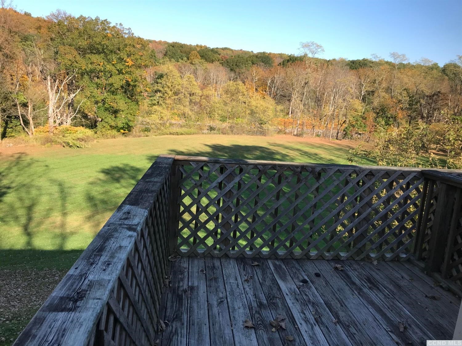 a view of a balcony with an outdoor space