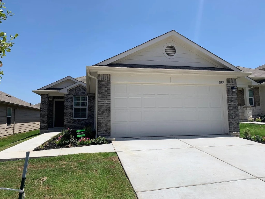 a front view of house with yard