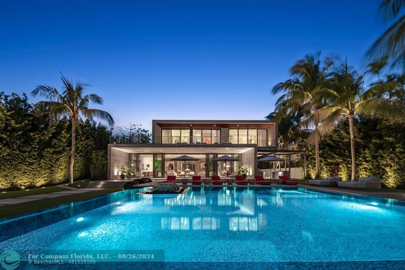 a view of a house with swimming pool