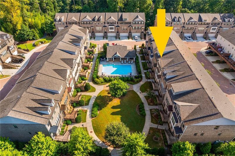 a view of a swimming pool with a patio