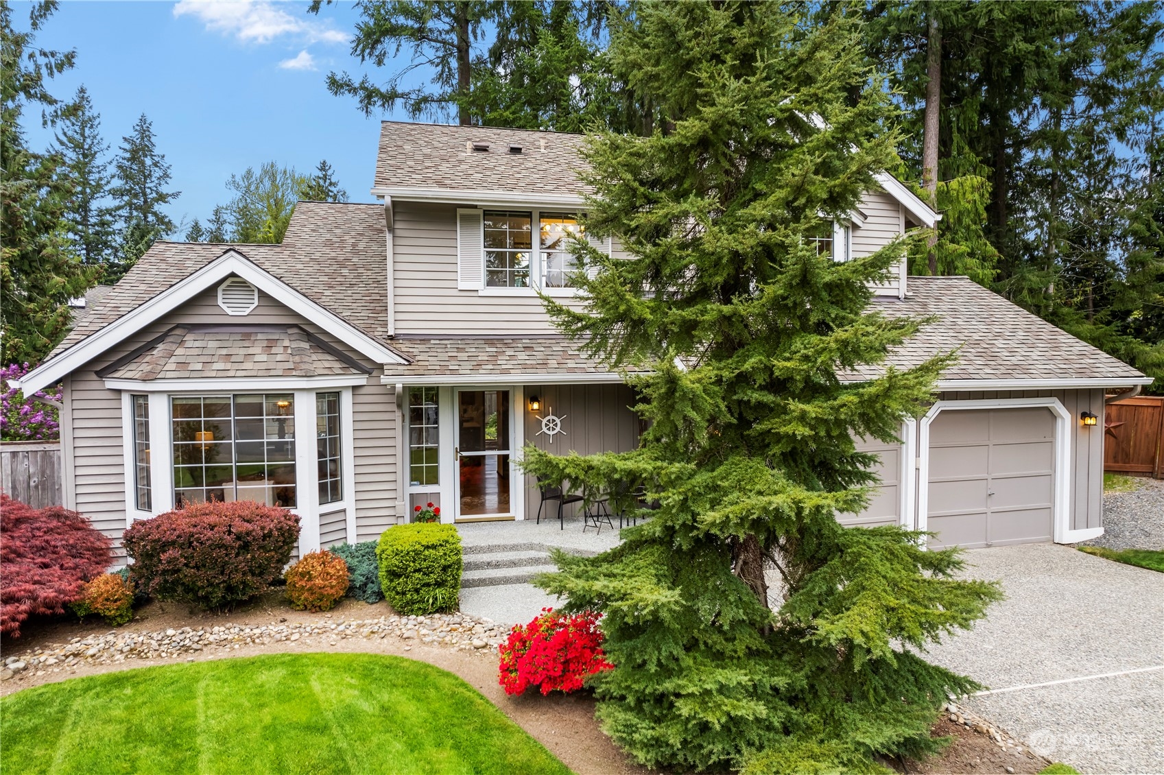 front view of a house with a yard