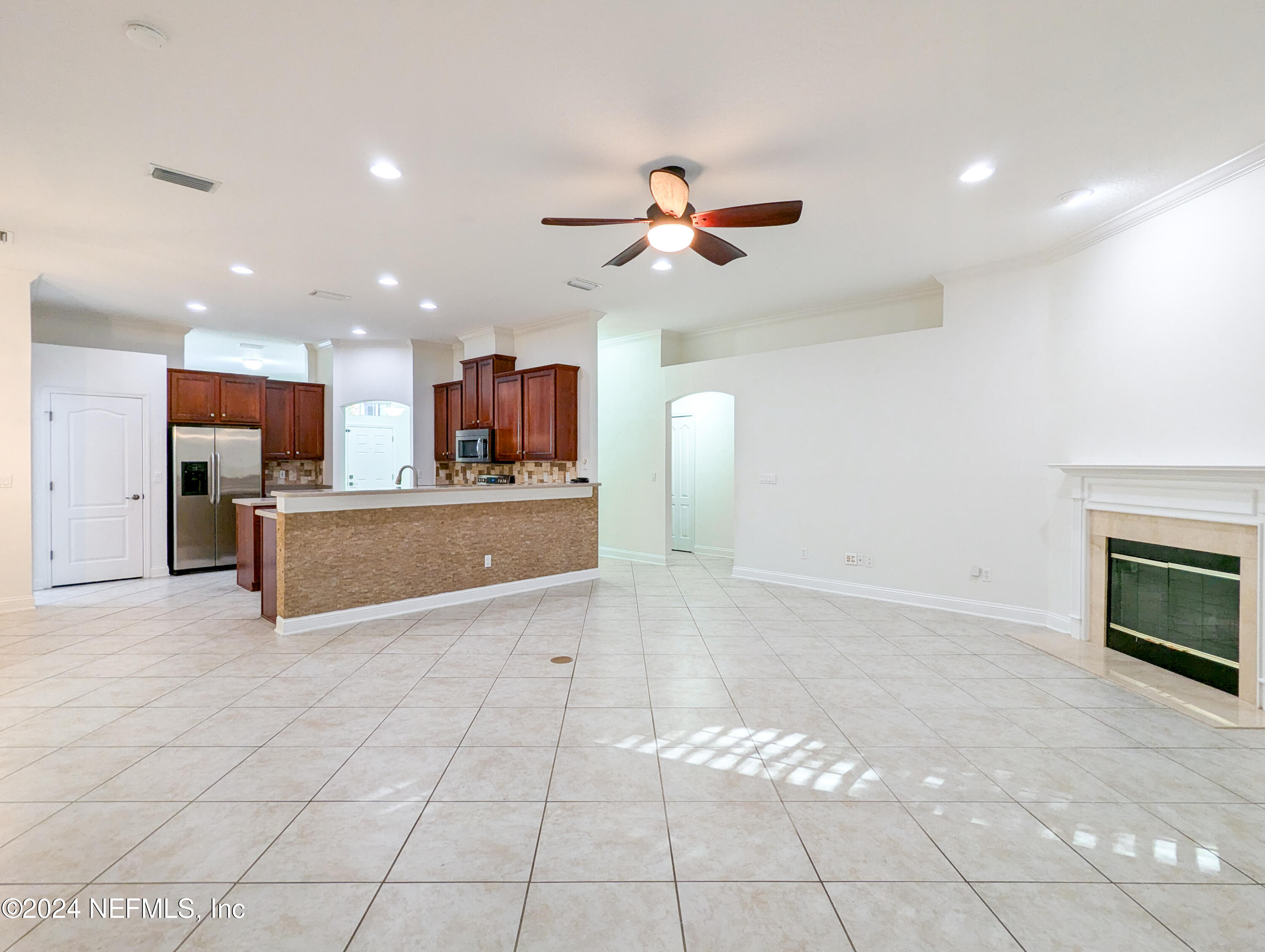 a view of kitchen and microwave