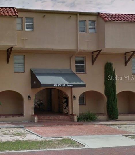 a front view of a house with a garage