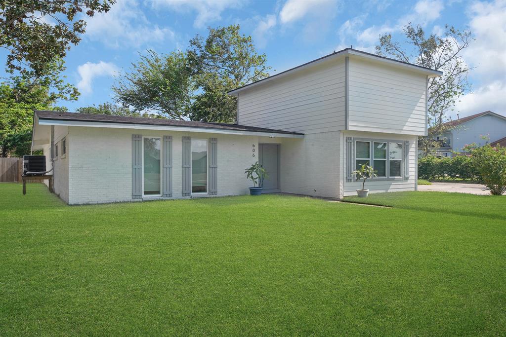 a house view with a garden space