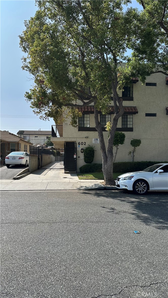 front view of a house with a street