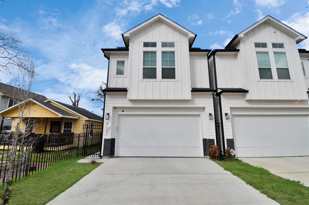 a front view of a house with yard