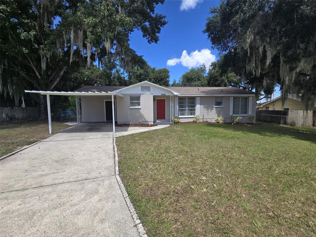 front view of a house with a yard