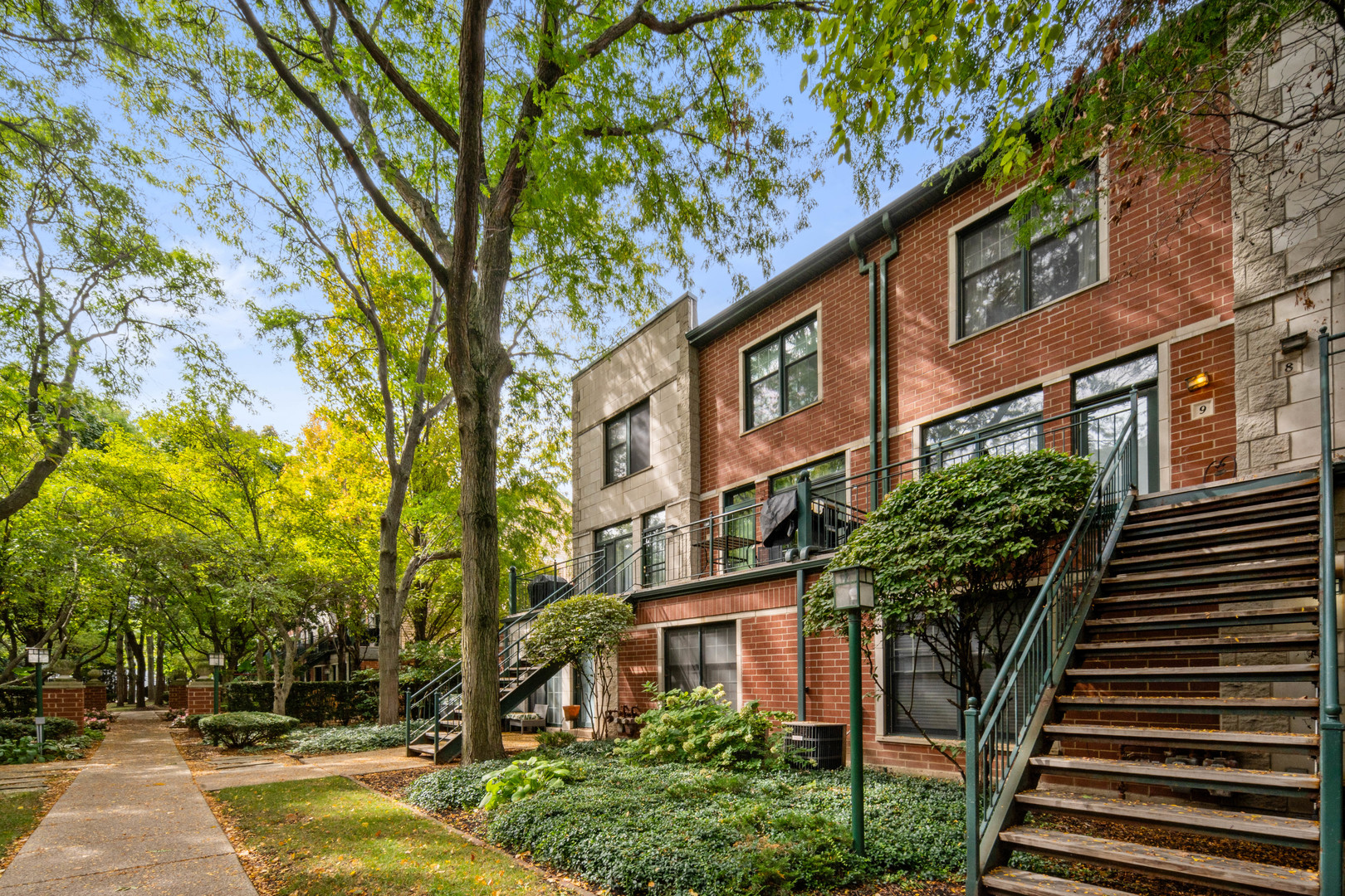 a view of a building with a tree