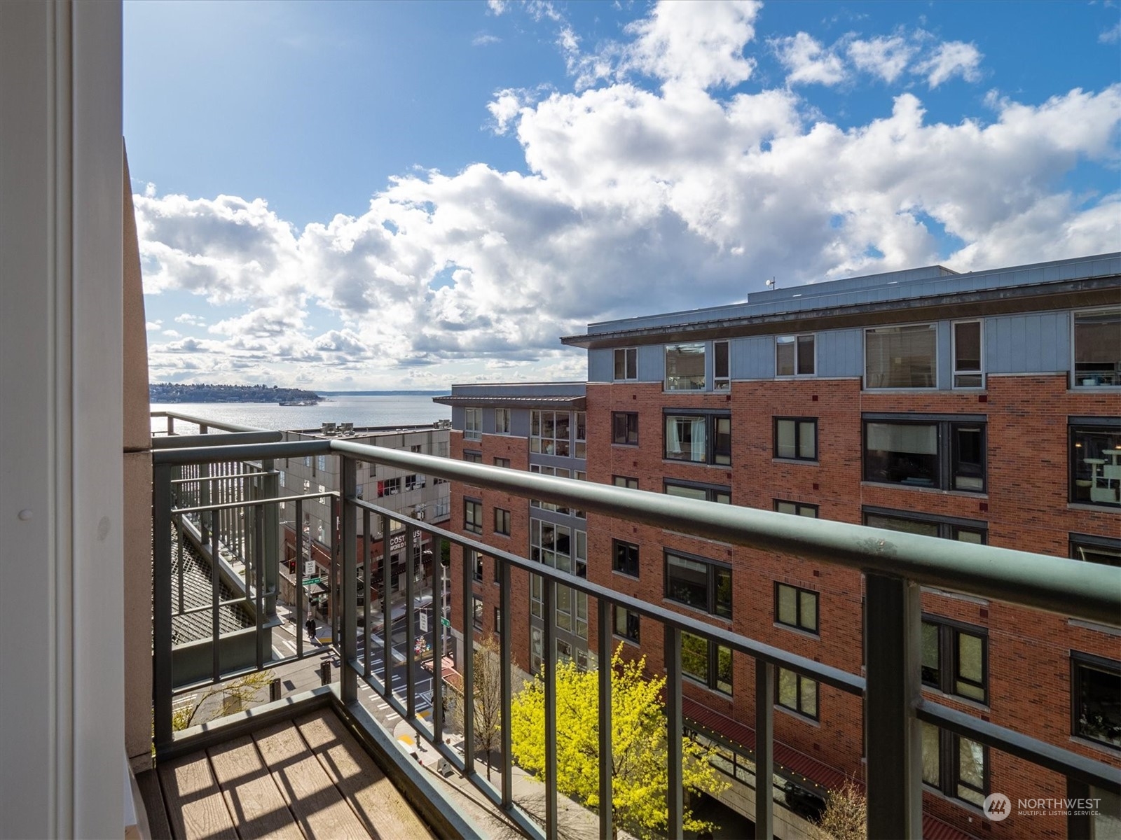 a view of a balcony with city view