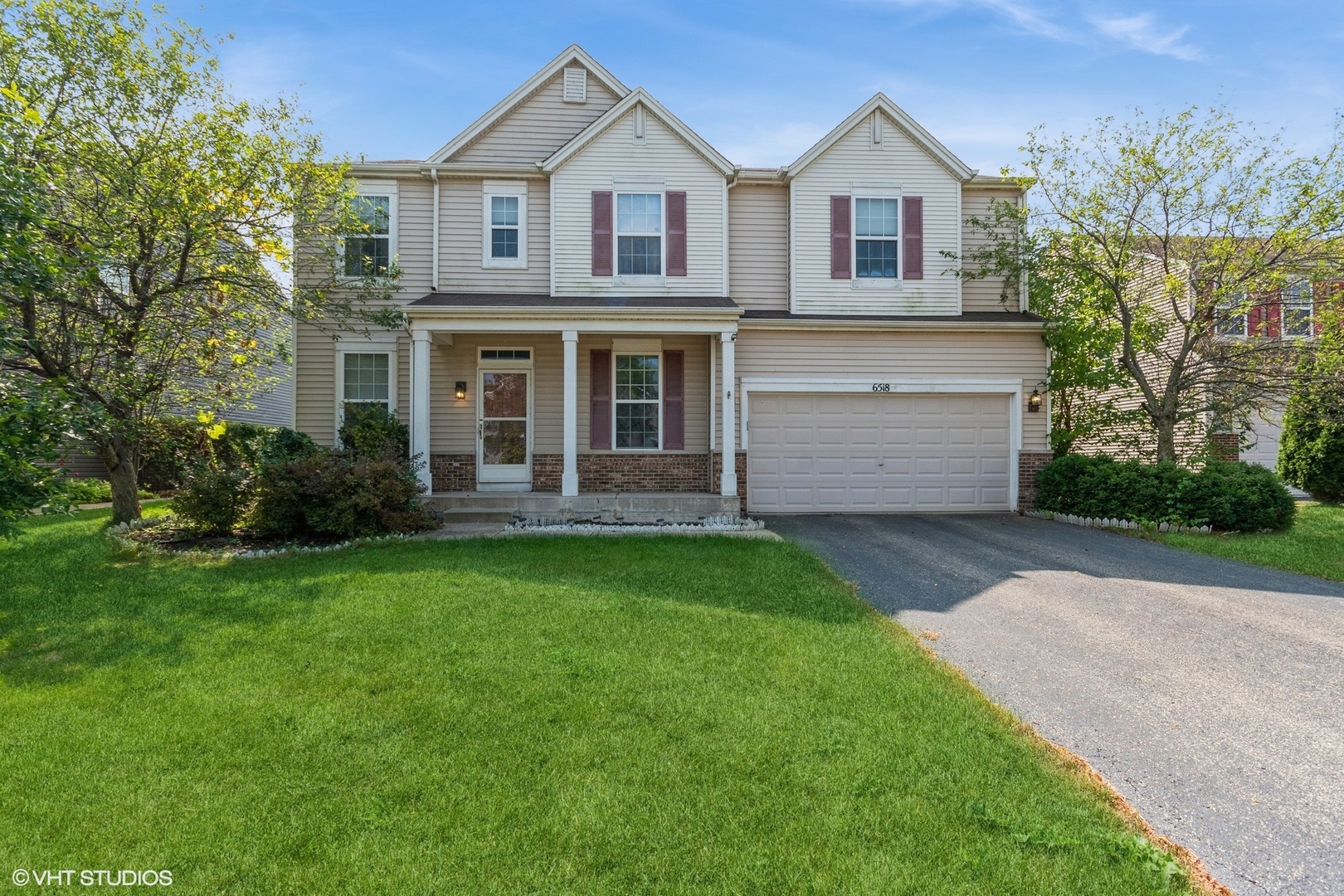 a view of a yard in front of house