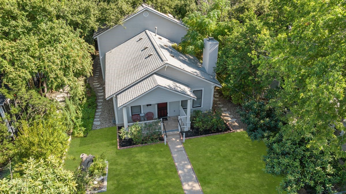 Welcome to 1317 Kenwood Avenue, a Craftsman gem in highly sought-after Travis Heights!