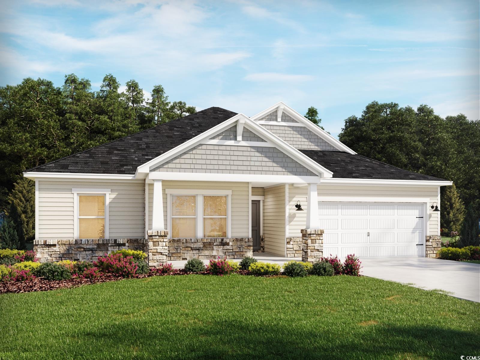 Craftsman-style house featuring a garage and a fro