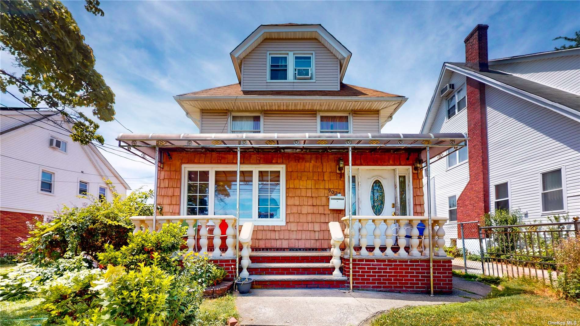 front view of a house with a porch