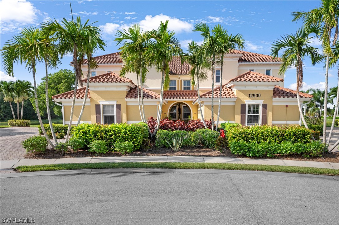 front view of a house with a garden