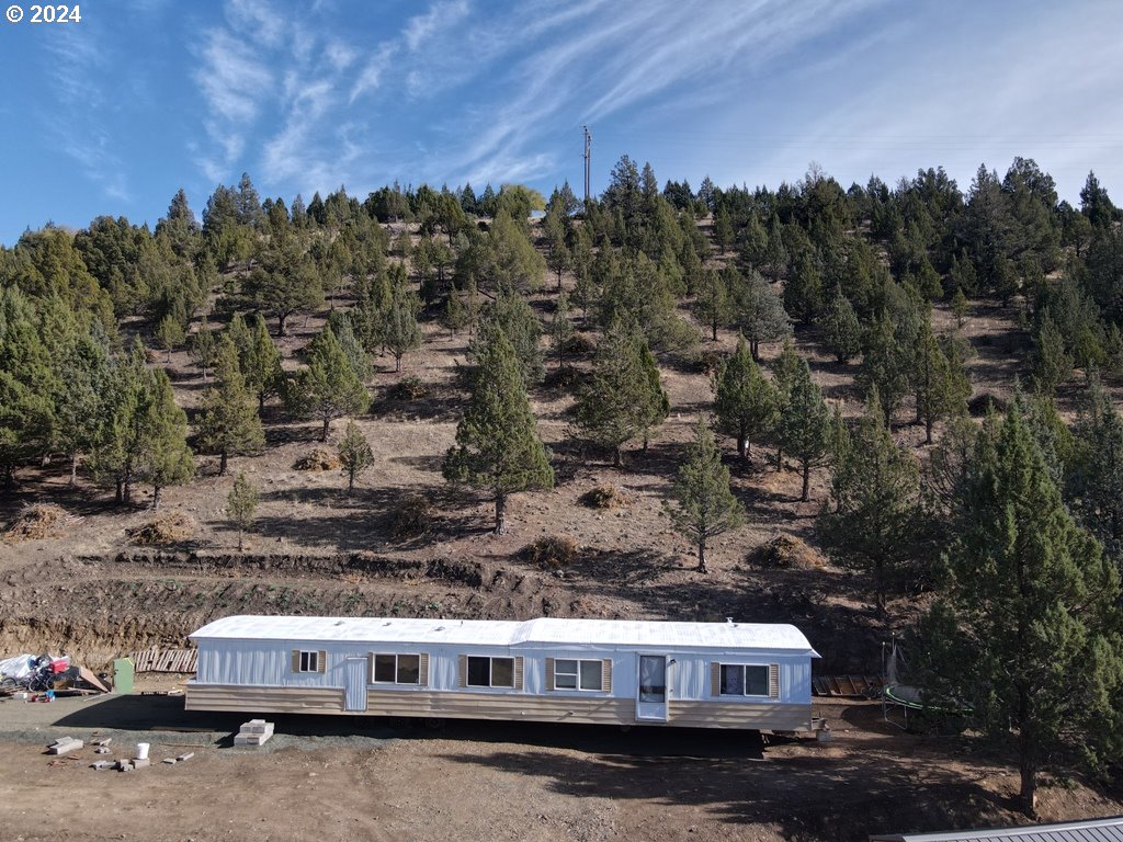 a view of house with outdoor space