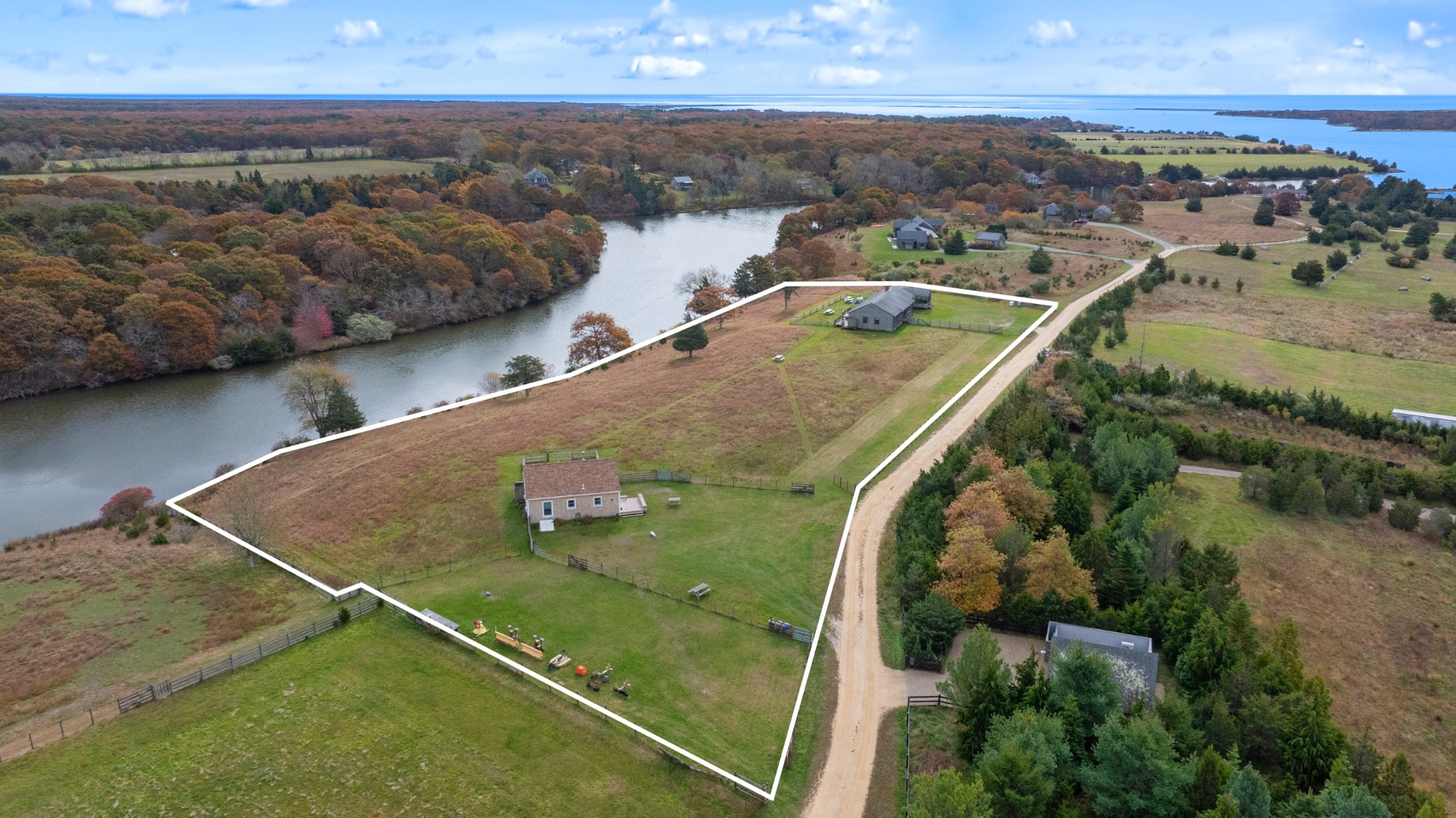 an aerial view of residential houses with outdoor space