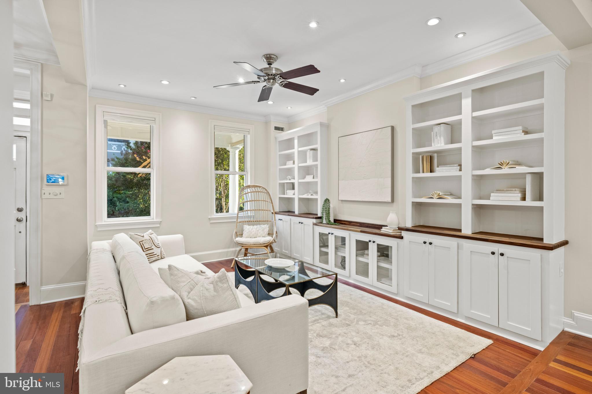 a living room with furniture and window