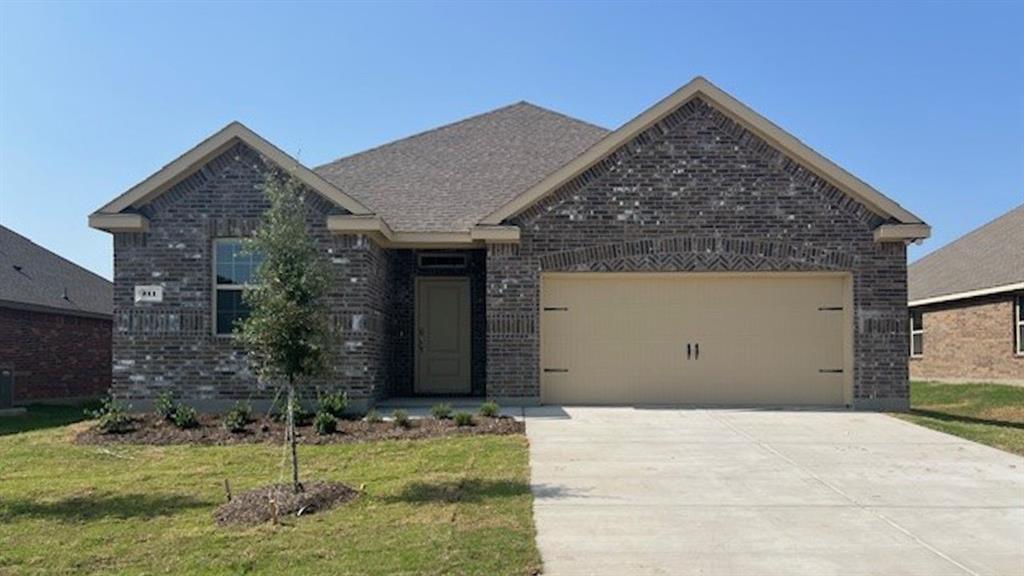 a front view of house with yard