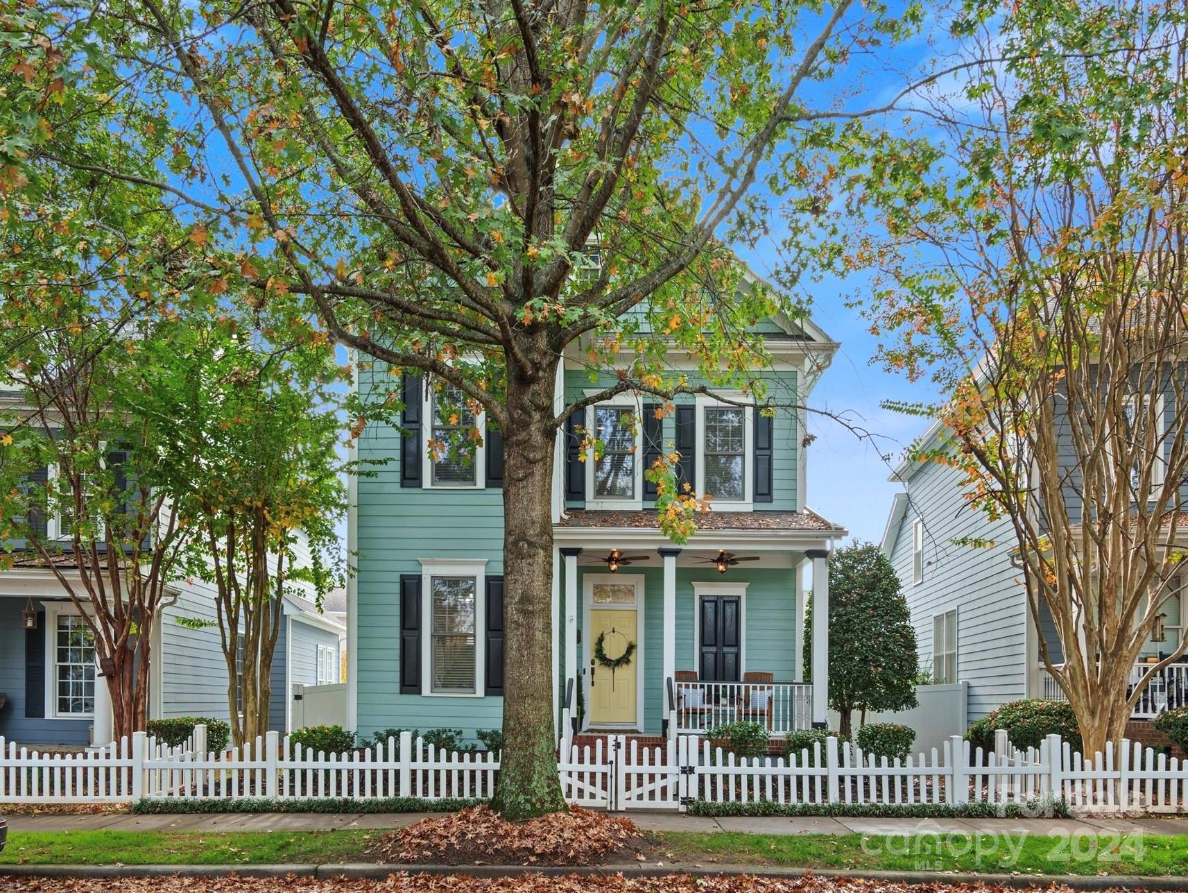 front view of a house with a garden