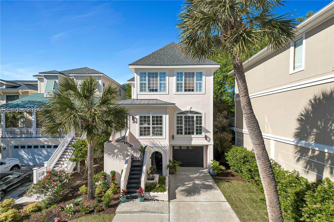 View of front of property with a garage