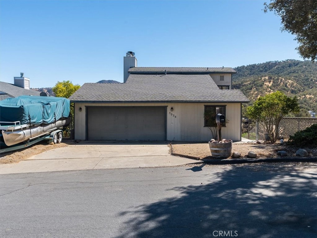 a front view of a house with a garage