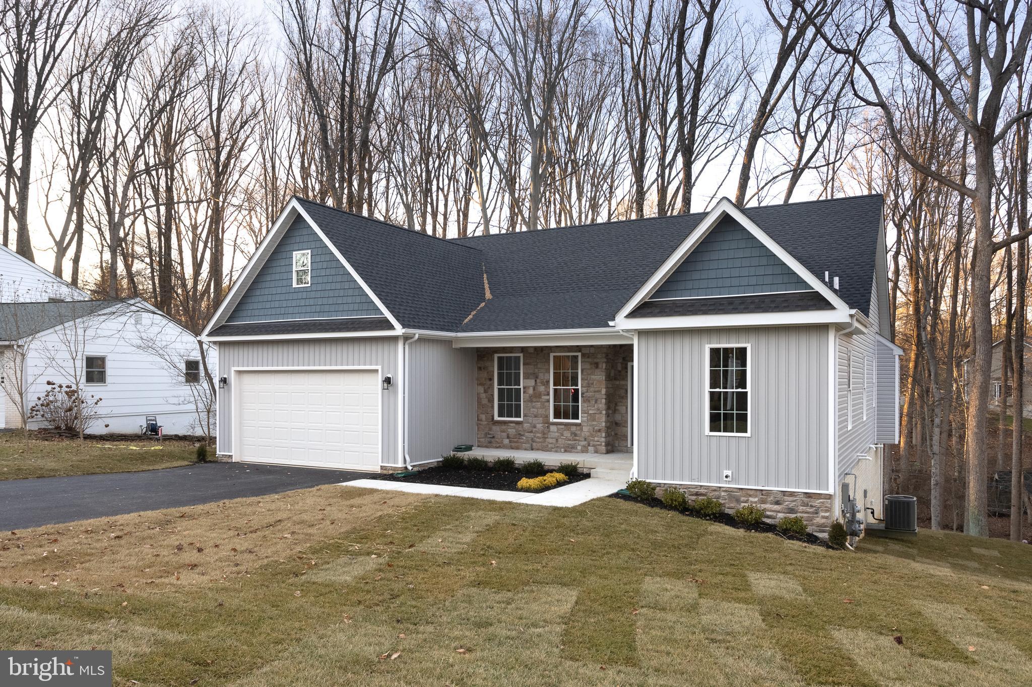 a front view of a house with yard