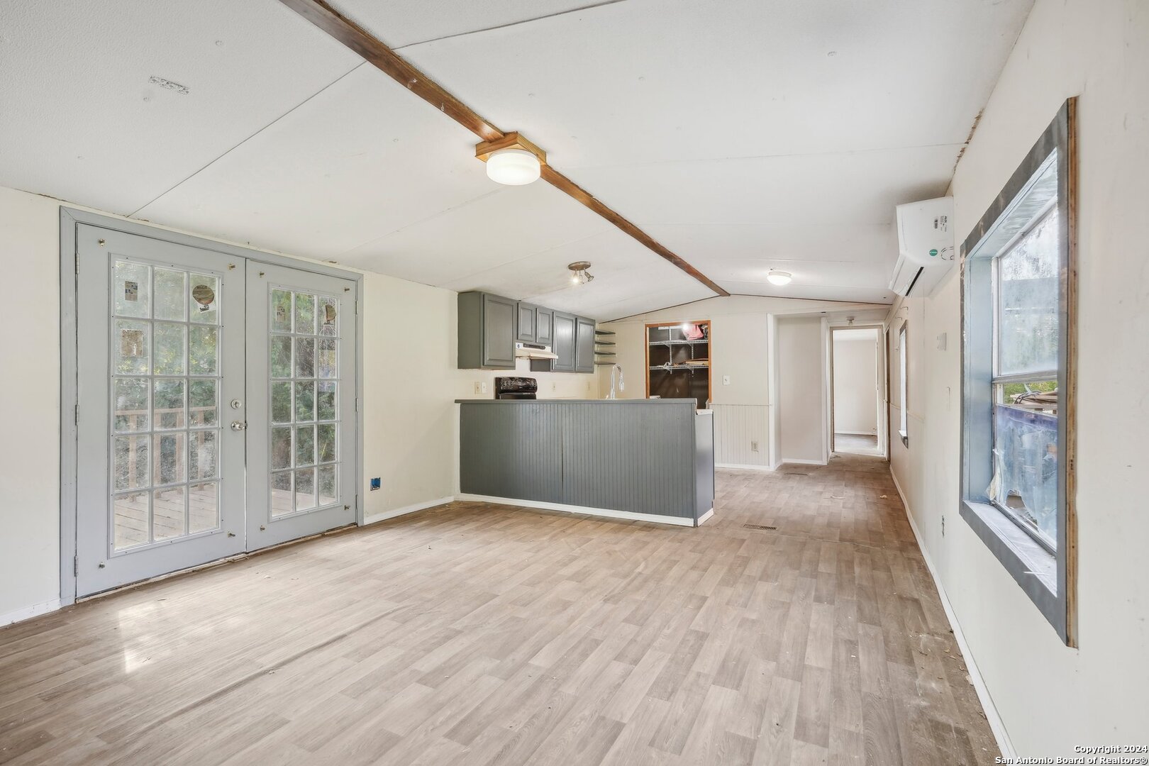 a view of livingroom with furniture and wooden floor