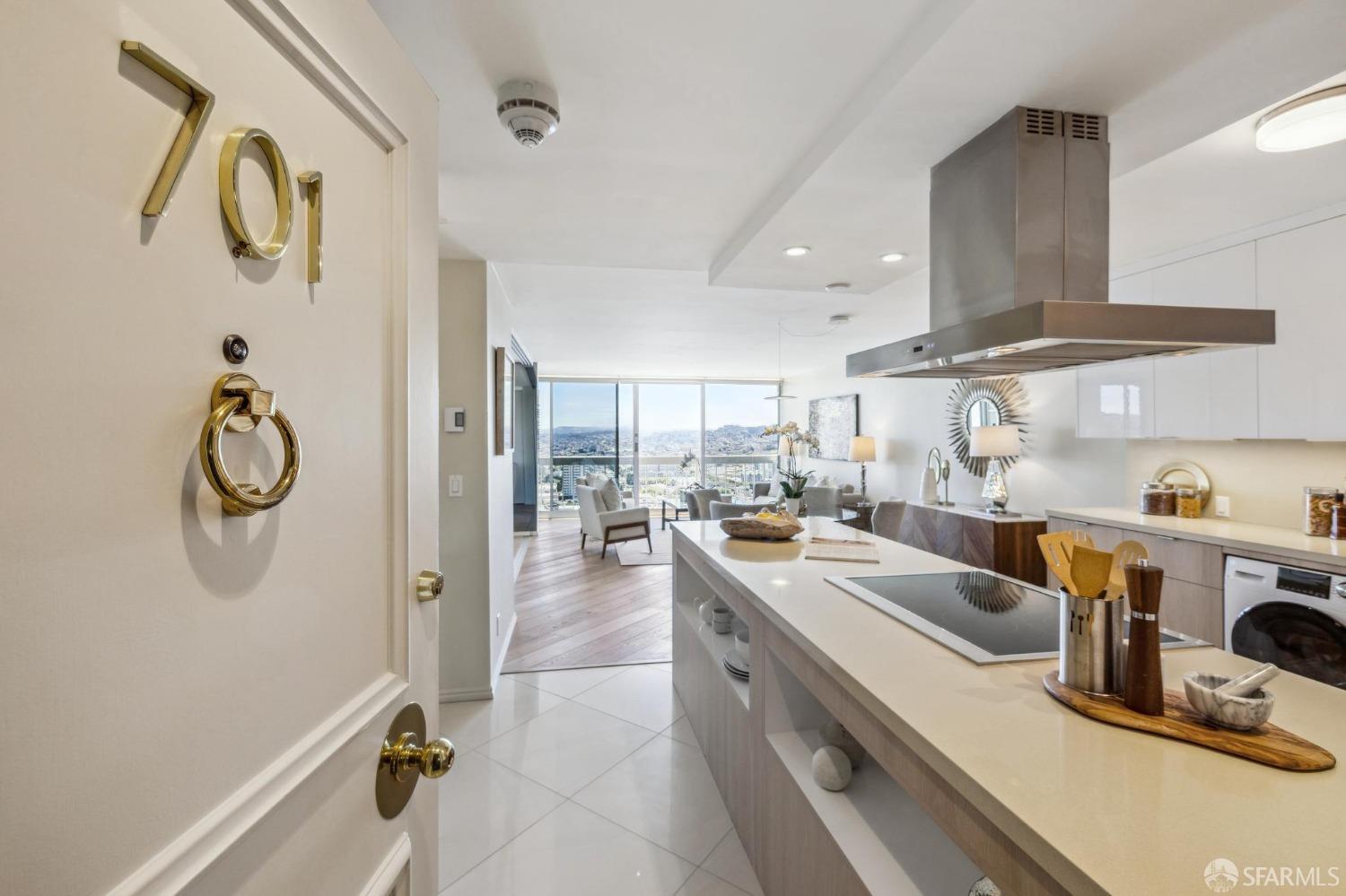 a kitchen with counter top space a sink and appliances