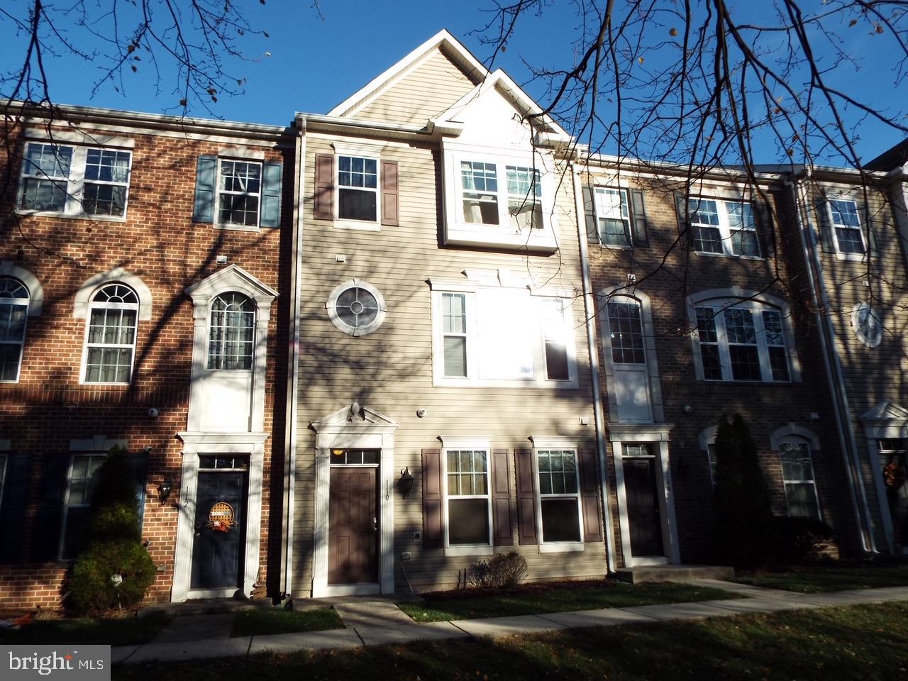 a front view of building with street view