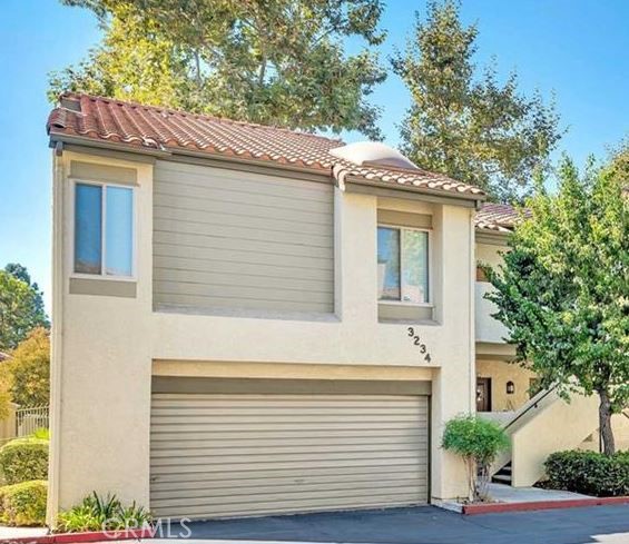 a view of a house with a garage