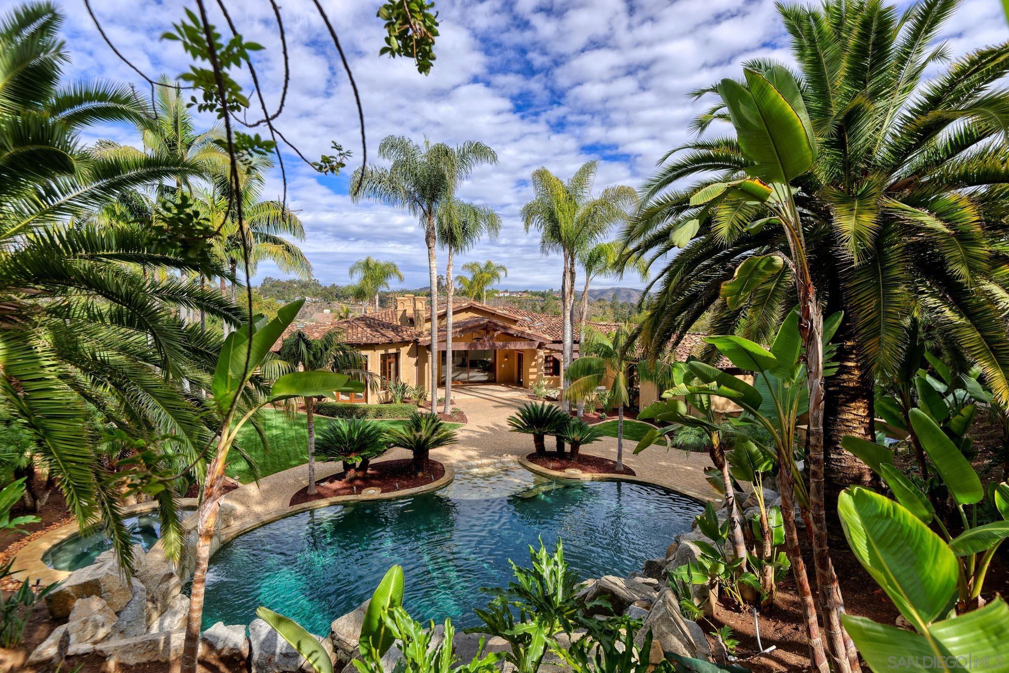 a view of swimming pool with a garden