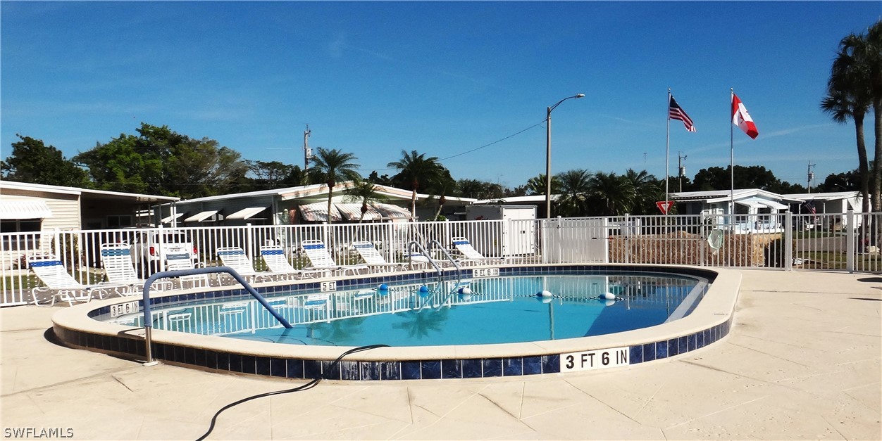 a view of a swimming pool with a patio