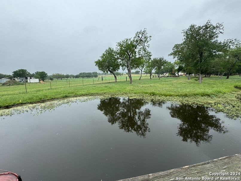 a view of a lake and green space