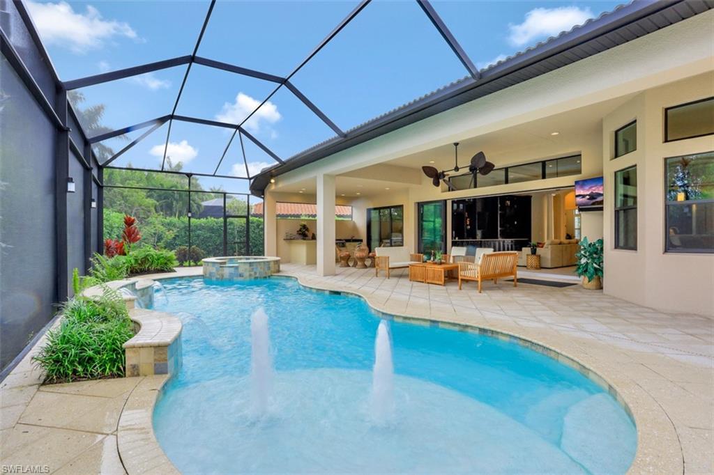 a view of a swimming pool with a patio