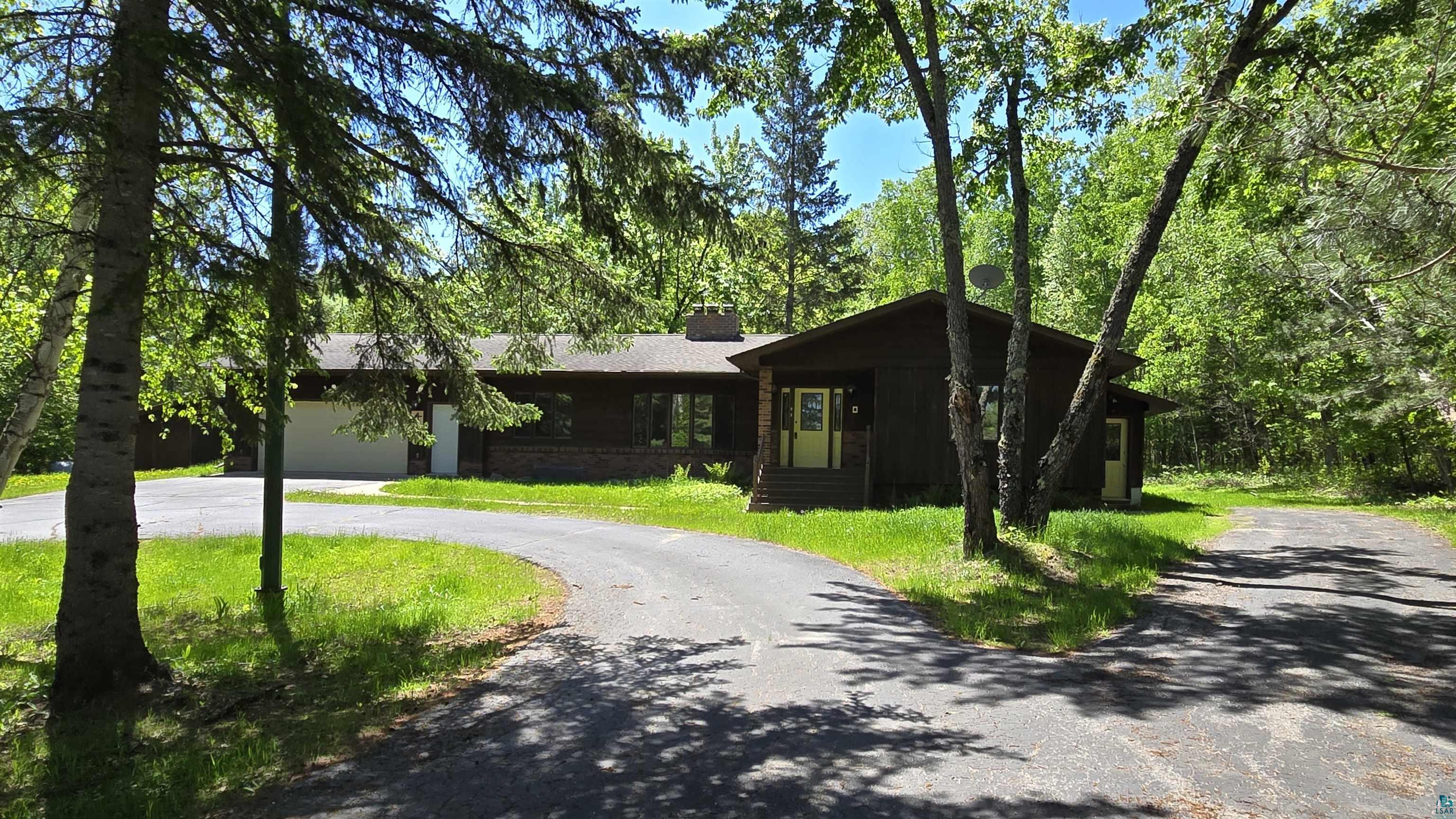 Ranch-style house with a garage