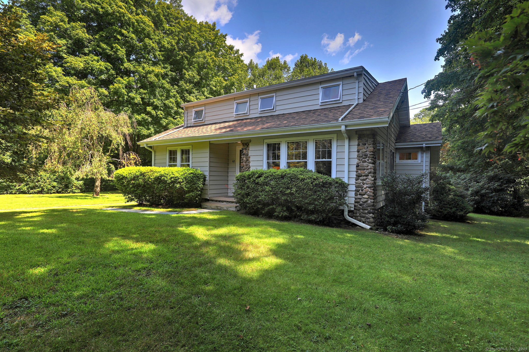 a view of a house with a garden