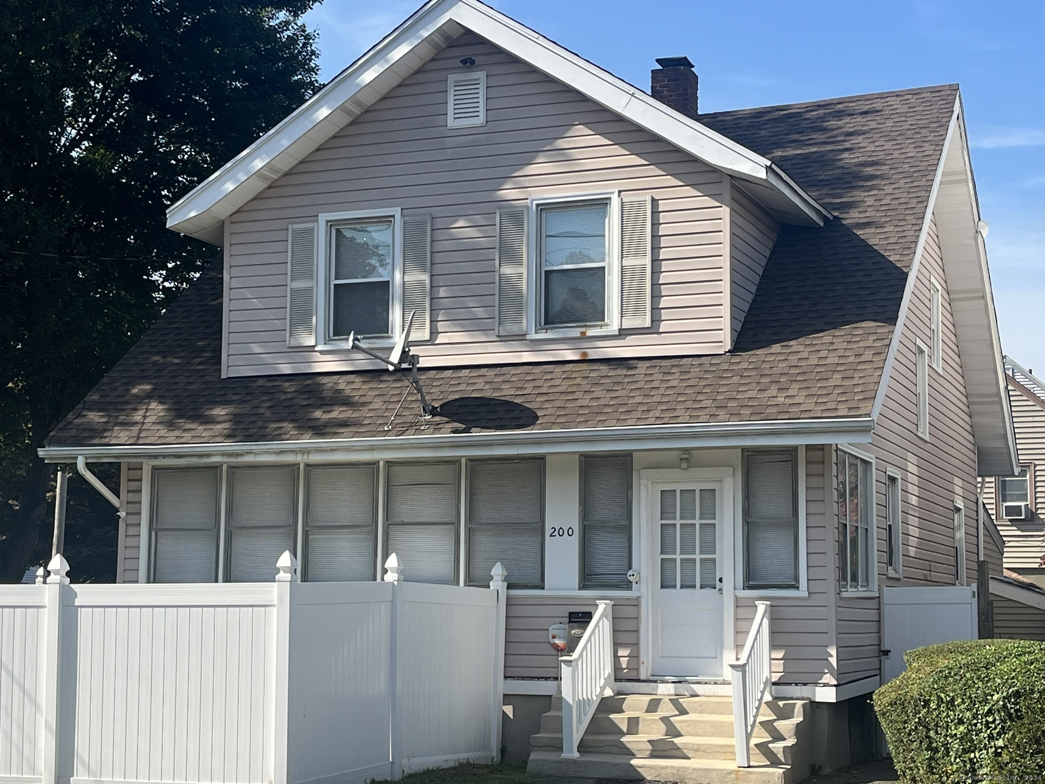 a view of a house with a porch