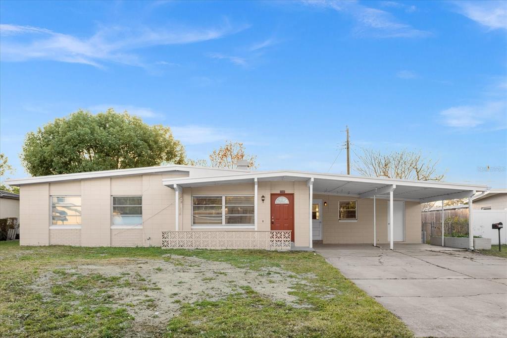 front view of a house with a yard